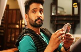SANTHANAM IN A COP ROLE THAT RESEMBLES THE MOVIE POKKIRI